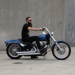 Mirror Finish 10" Ape Hanger Handlebars 1.25" 1 1/4 inch Diameter side view of softail standard FXST with rider for Harley Davidson barcraft stainless softail fatboy breakout