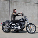 Mirror Finish Old School Ape Hanger Handlebars 1" Diameter on FXD super glide motorcycle side view with rider for Harley Davidson barcraft stainless softail dyna sportster 